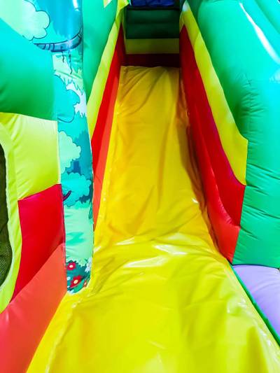 Коммерческий надувной батут "Джунгли" с горкой, 9*6*4.5 м