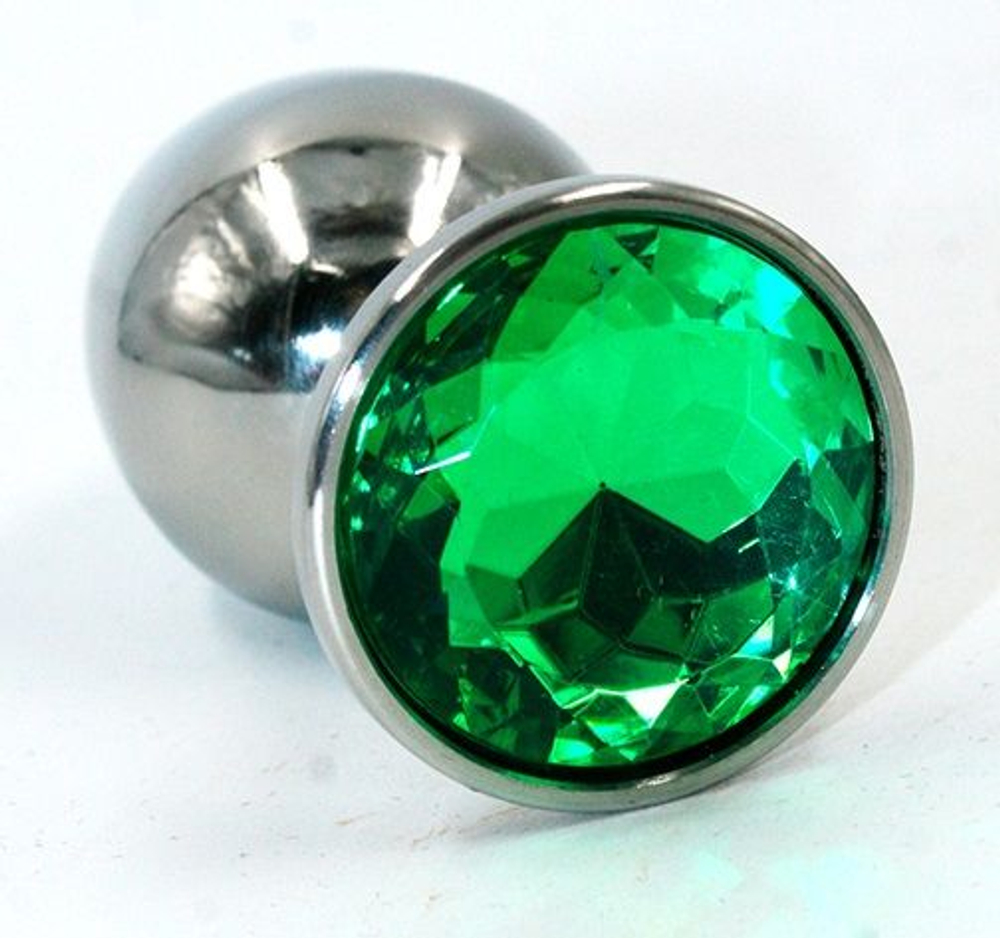 Серебристая средняя анальная пробка с изумрудным кристаллом - 8 см. (Цвет: изумрудный)