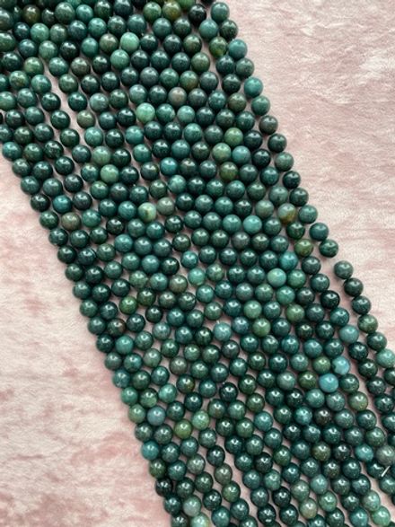 Нить бусин из агата 10,5мм