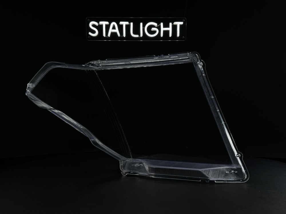 Левое стекло фары Nissan Navara Pathfinder R51 2004-2010