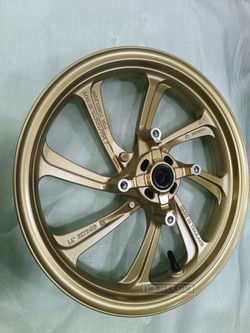 44650-K97-T00ZB. WHEEL SUB ASSY., FR. Gold color. Honda PCX