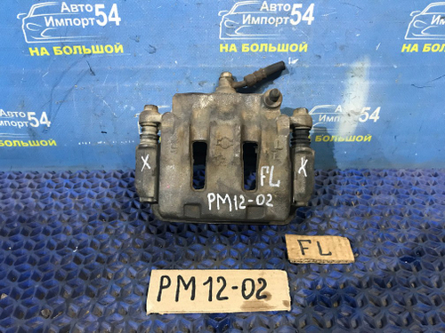 Суппорт тормозной передний левый NISSAN LIBERTY 1999