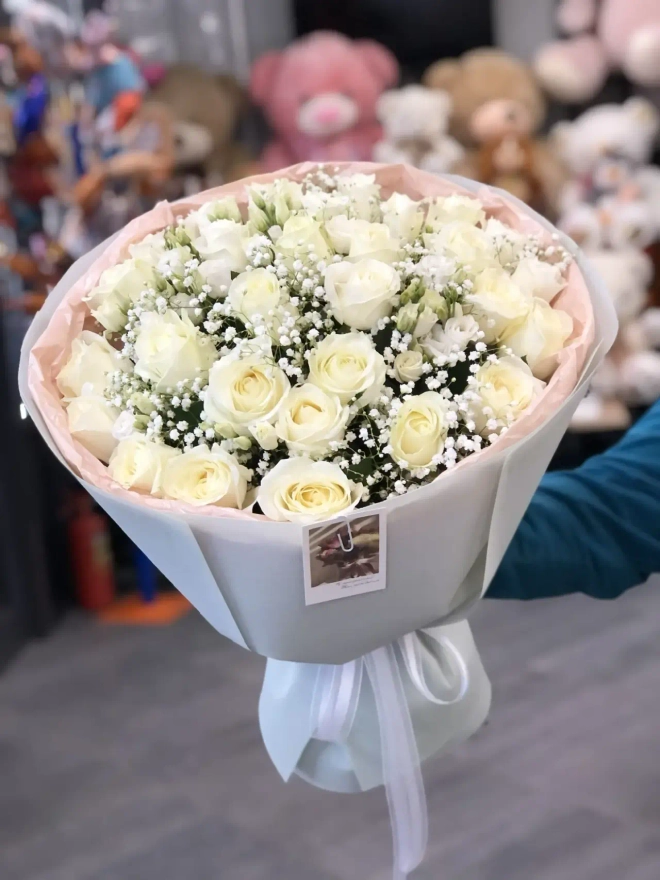 Букеты из белых роз