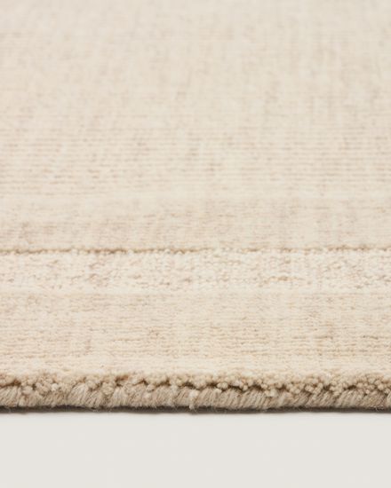 Бежевый шерстяной жаккардовый ковер Calira 230 x 160 см