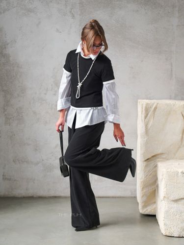 Трикотажный черный костюм с вышивкой-лого