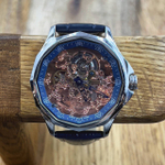 Часы Corum