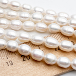 Жемчуг Рис, размер около 7-8,5 мм, цена за отрезок 17 см (1/2 нити)