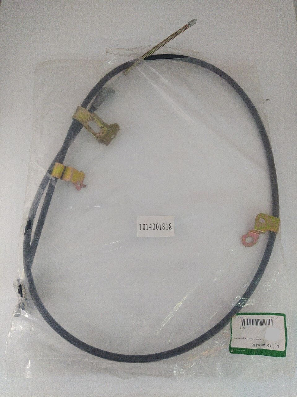 Трос ручного тормоза левый 1014001818 Geely MK, MK Cross