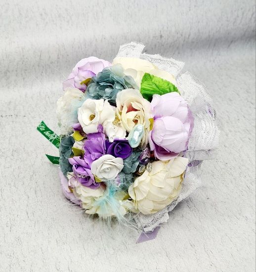 Свадебный букет из маков из орхидей