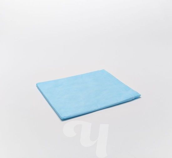 Одноразовая простыня голубая сложенная 200х80