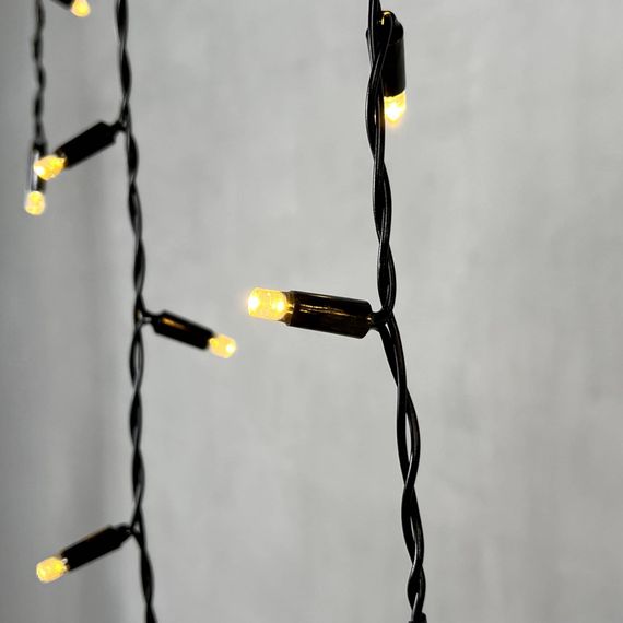 Светодиодная бахрома с колпачком 3,1*0,5 м., 120 теплых белых LED ламп, черный провод ПВХ, IP65, LTC (PIL120CAP-11-2WW)