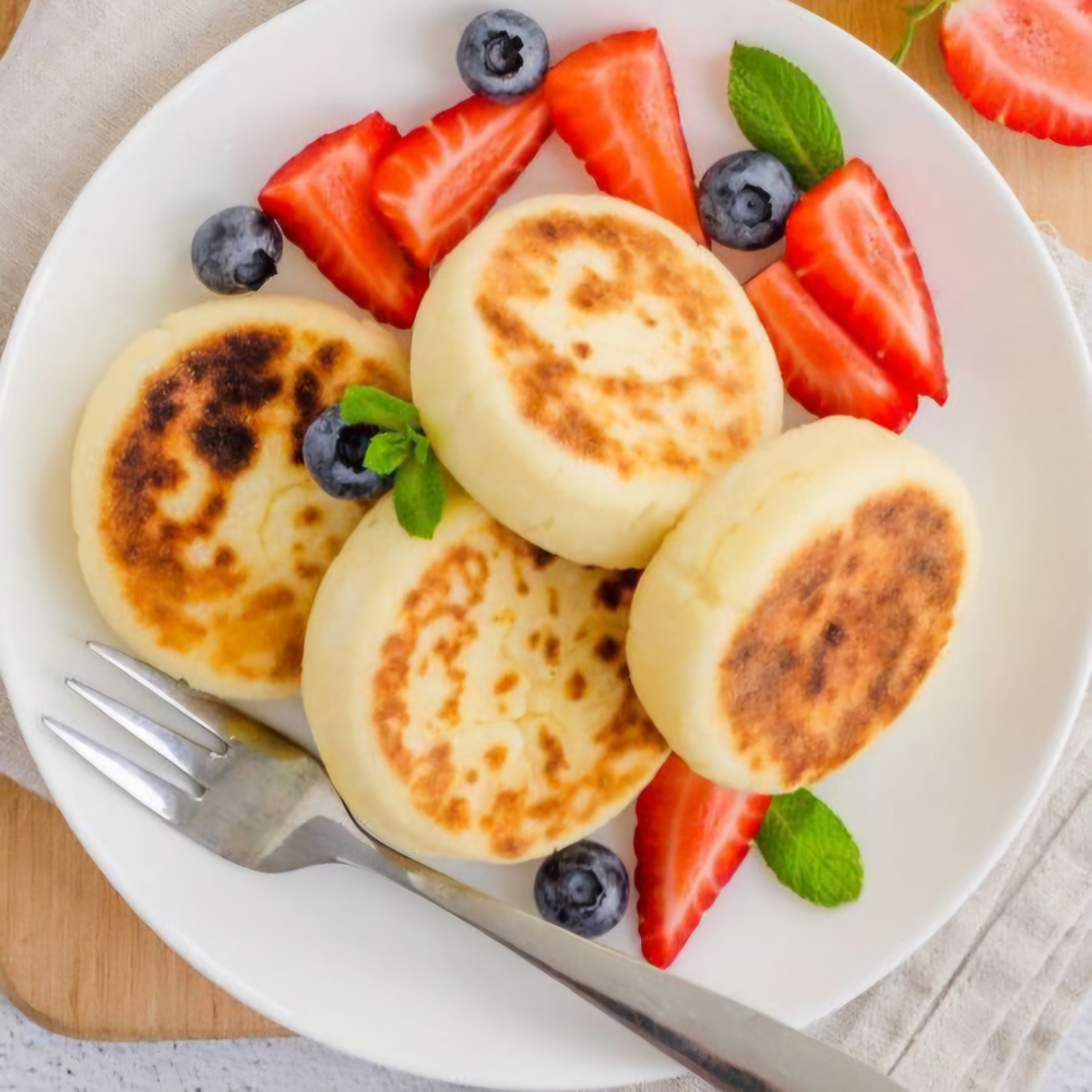Сырники сладкие с изюмом, жареные