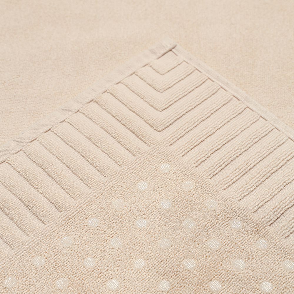 Коврик для ванной с фактурным бортиком кремового цвета из коллекции Essential, 50x80 см