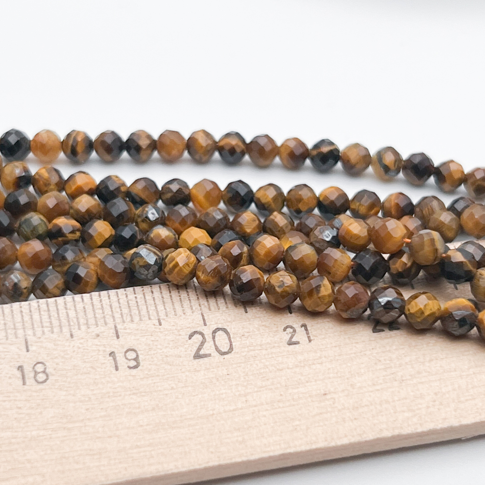 Тигровый глаз граненый бусины, размер около 4,1-4,3 мм, цена за отрезок 19 см (1/2 нити)