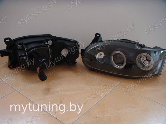Передние фары Ford Escort 7 angel eyes black
