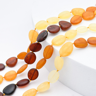 Янтарь бусины, микс, матовая плоская галтовка, размер 10,3-12,4*2,7-4,2 мм, цена за 15-16 шт (1/2 нити)