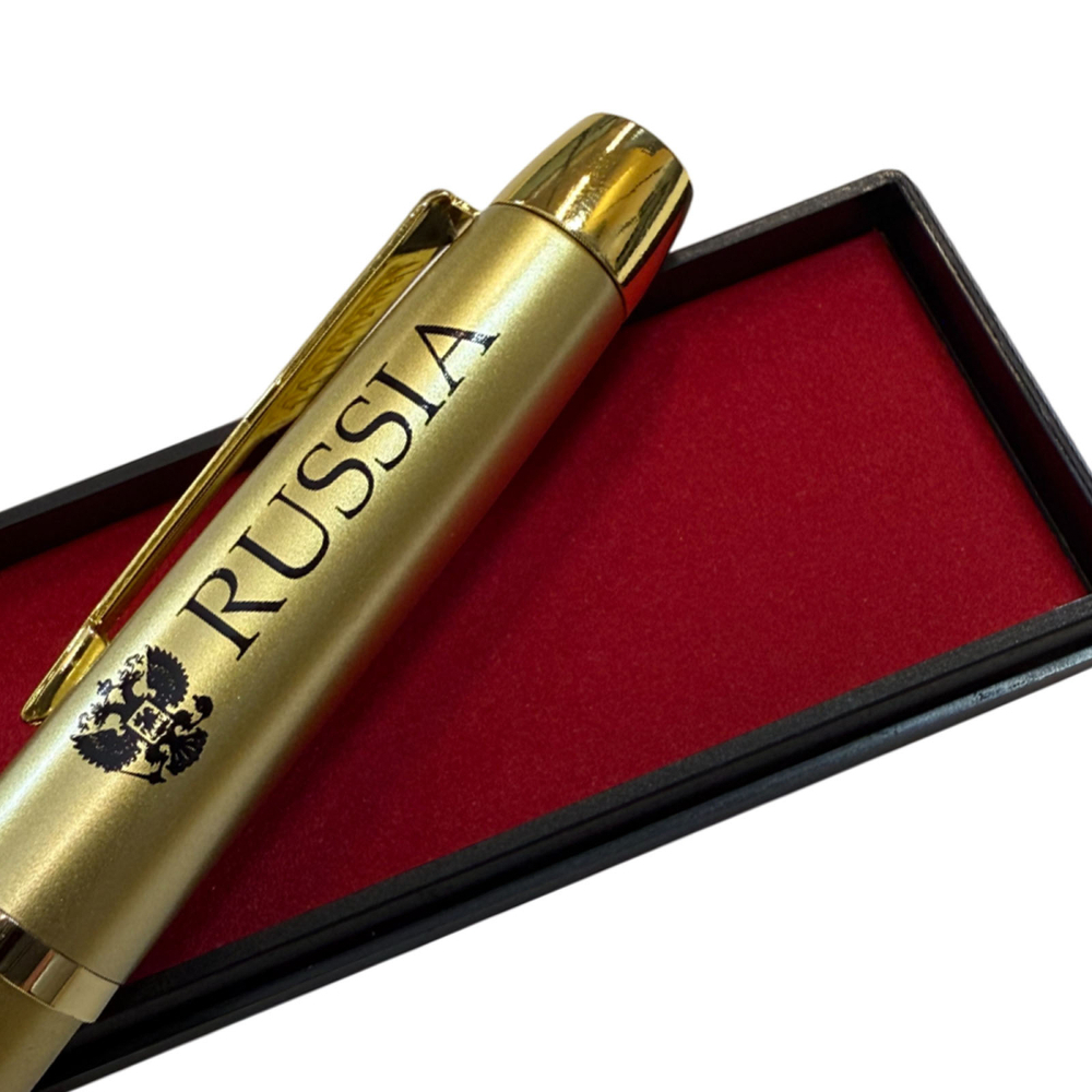 Сувенирная ручка золотистого цвета с гравировкой "RUSSIA"