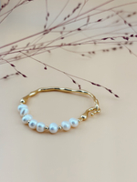 Жемчужный браслет с золотой дугой