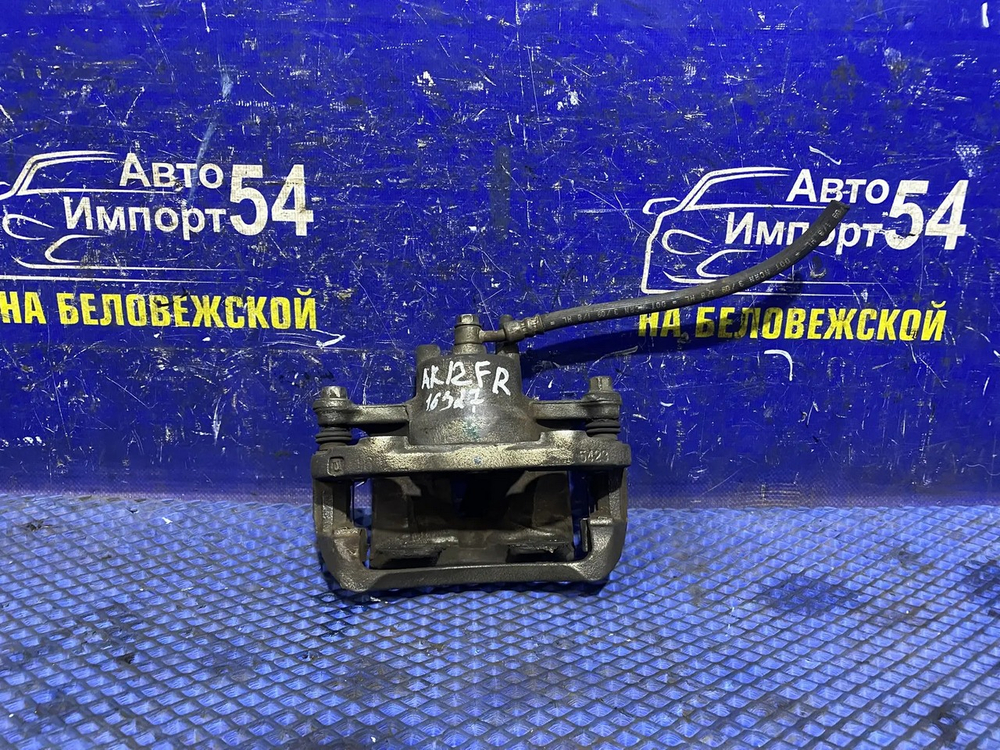 Суппорт тормозной передний правый NISSAN MARCH 2002-2010