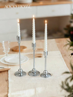 Серебряный набор из трех подсвечников