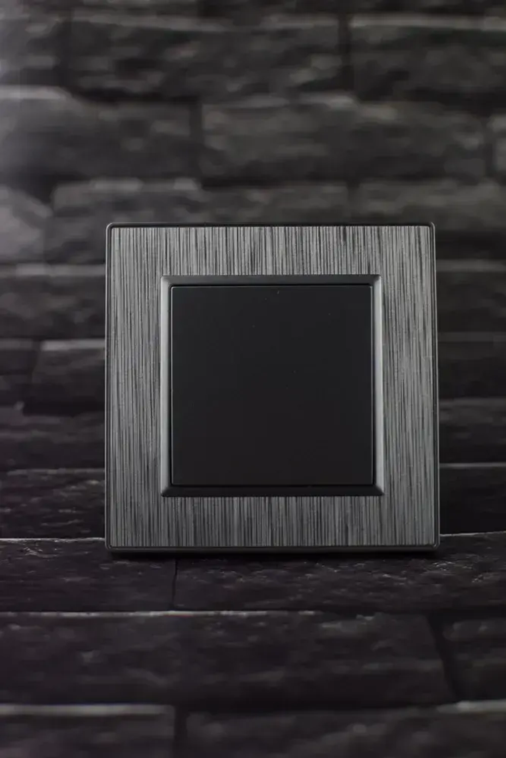 Выключатель одноклавишный серый