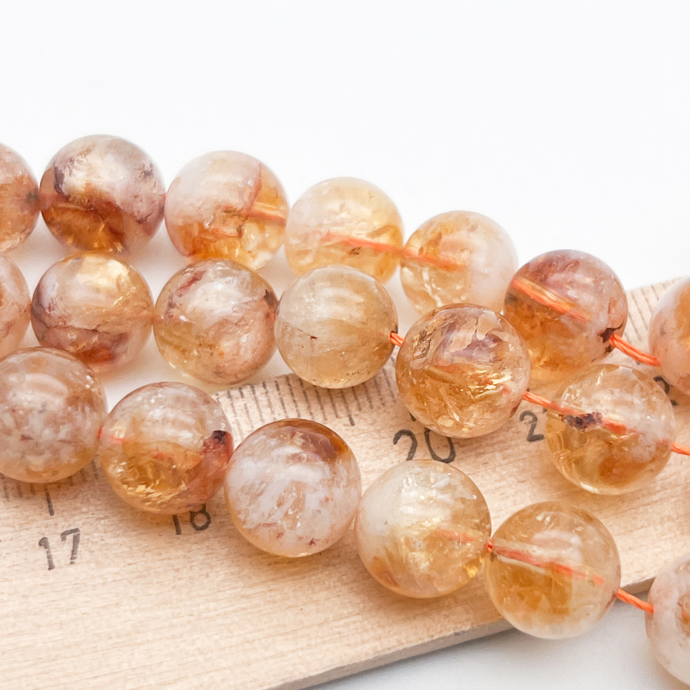 "Цитрин" бусины (кварц), диаметр 10,3-10,7 мм, цена за 9 шт (1/4 нити)