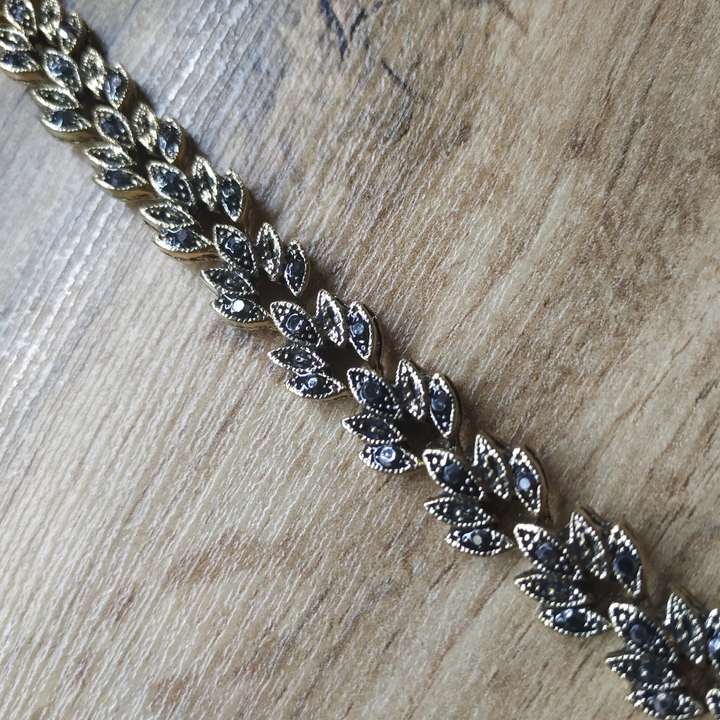 Браслет Венеция лотос стразы графит металл черненый золотистый