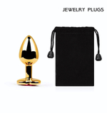 Золотистая анальная пробка с малиновым кристаллом-сердечком - 7 см. (Цвет: малиновый)