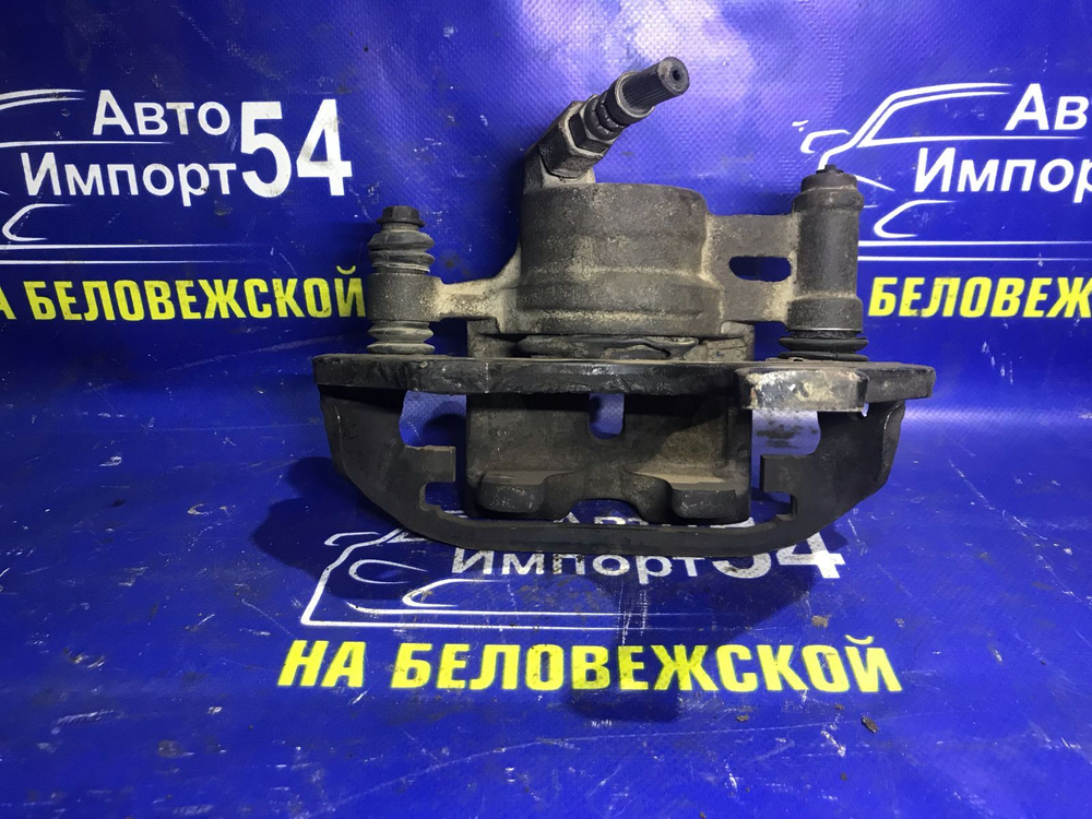 Суппорт тормозной передний левый TOYOTA LITEACE 1988