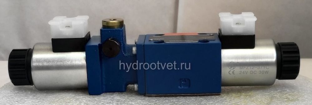 4WEMM6HB6X/CG24N9Z4 - Гидрораспределитель золотниковый Ду6 с электрическим и ручным управлением от рычага, схема HB (14-2), электроуправление G24, возврат - пружинный