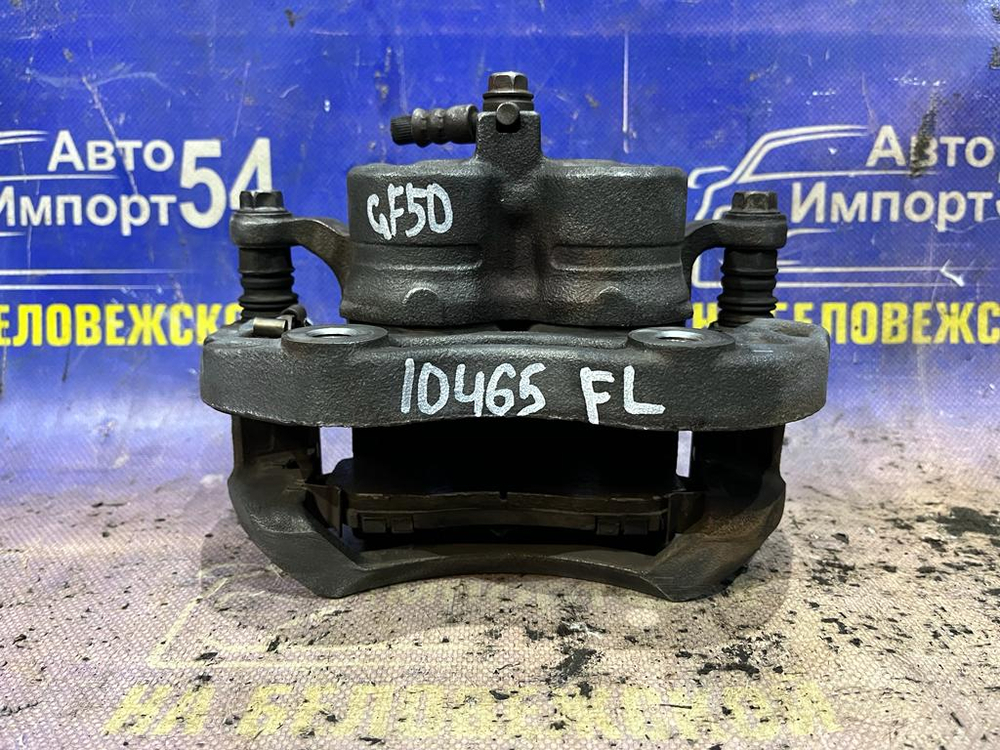 Суппорт тормозной передний левый NISSAN CIMA 2001-2010