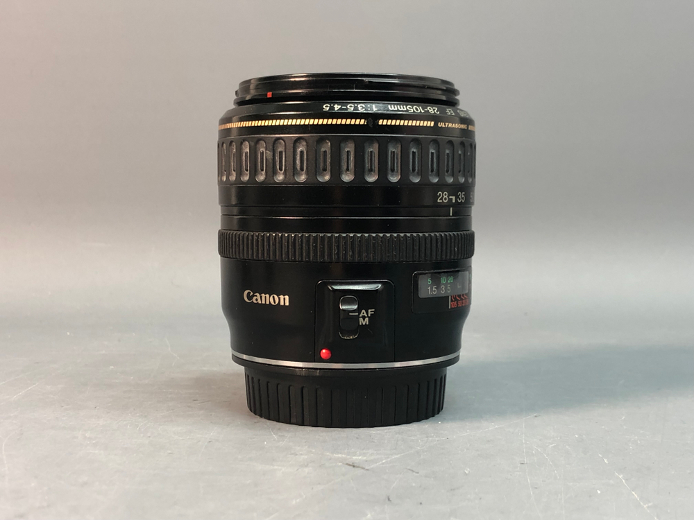 Canon EF 28-105mm 3.5-4.5 USM скол на задней линзе