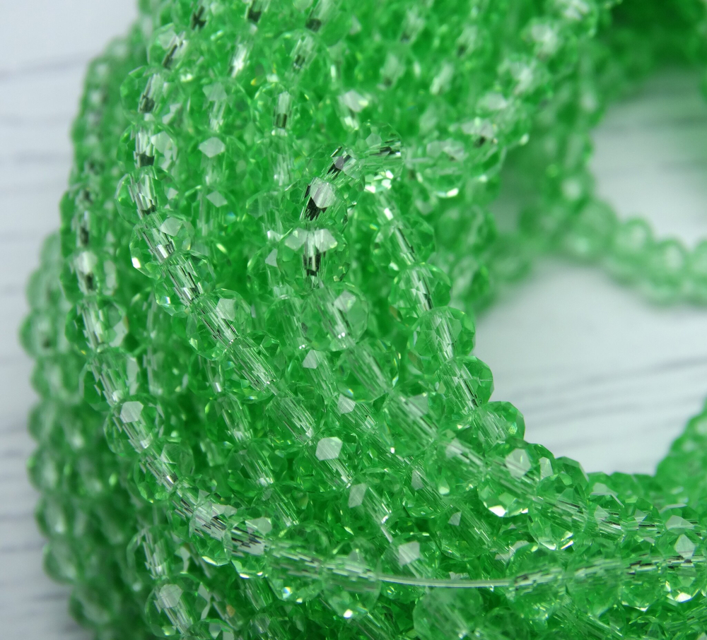 БП020НН34 Хрустальные бусины "рондель", цвет: светло-зеленый прозрачный, 3х4 мм, кол-во: 95-100 шт.