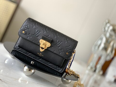 Louis Vuitton Vavin Chain Wallet