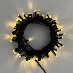 Светодиодная гирлянда с колпачком 100 теплых белых LED ламп 10 м., 24В., черный провод ПВХ, IP65, LTC (PST100CAP-11-1WW)