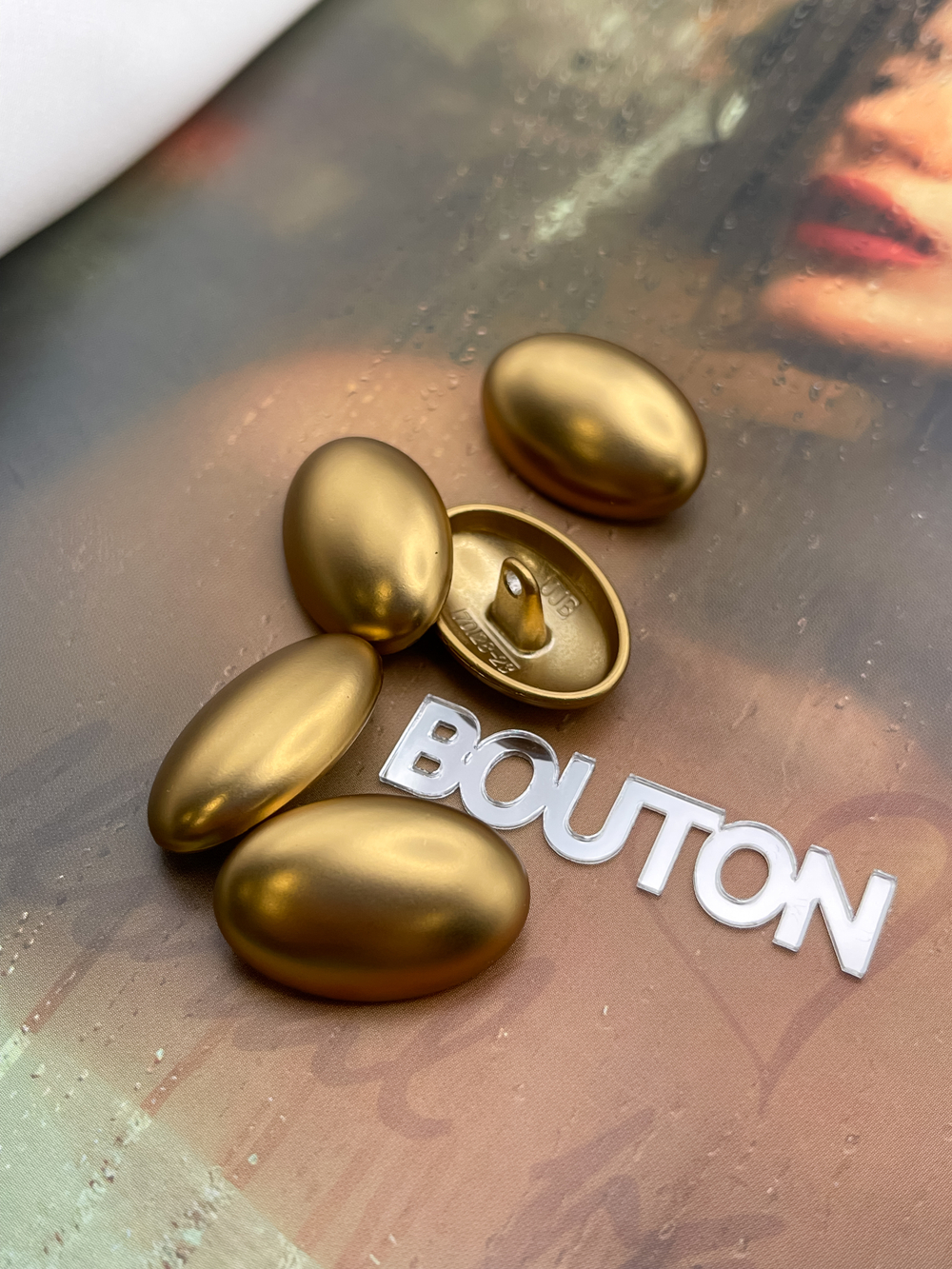 Пуговицы овальные бронзовые