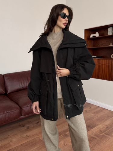 Черная женская куртка трансформер