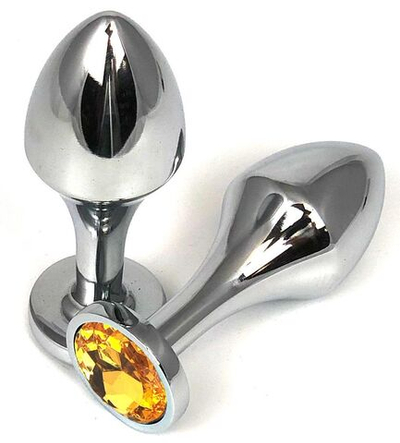 Серебристая анальная пробка на удлиненной ножке с оранжевым кристаллом - 8 см. (Цвет: оранжевый)