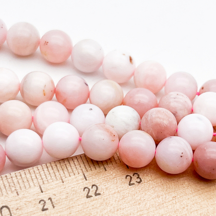 Опал розовый бусины, диаметр около 8,3-8,5 мм, цена за 11 шт (1/4 нити)