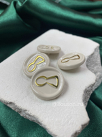 Пуговицы Скиапар. глянцевая золотистая "Замочная скважина" кремово-бежевая эмаль