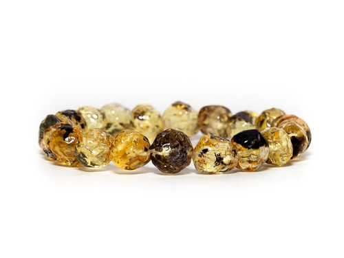 Браслет из цельного натурального янтаря, бусины 10-11 мм "кусанка с включениями"