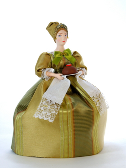 Кукла фарфоровая грелка на чайник Купчиха с хлебом-солью