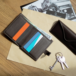 Кошелек женский Tresor из кожи теленка, темно-коричневого цвета