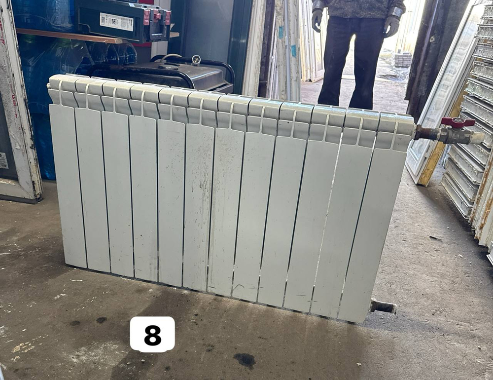 Биметаллический радиатор Б/У 500 12 секц. бок.