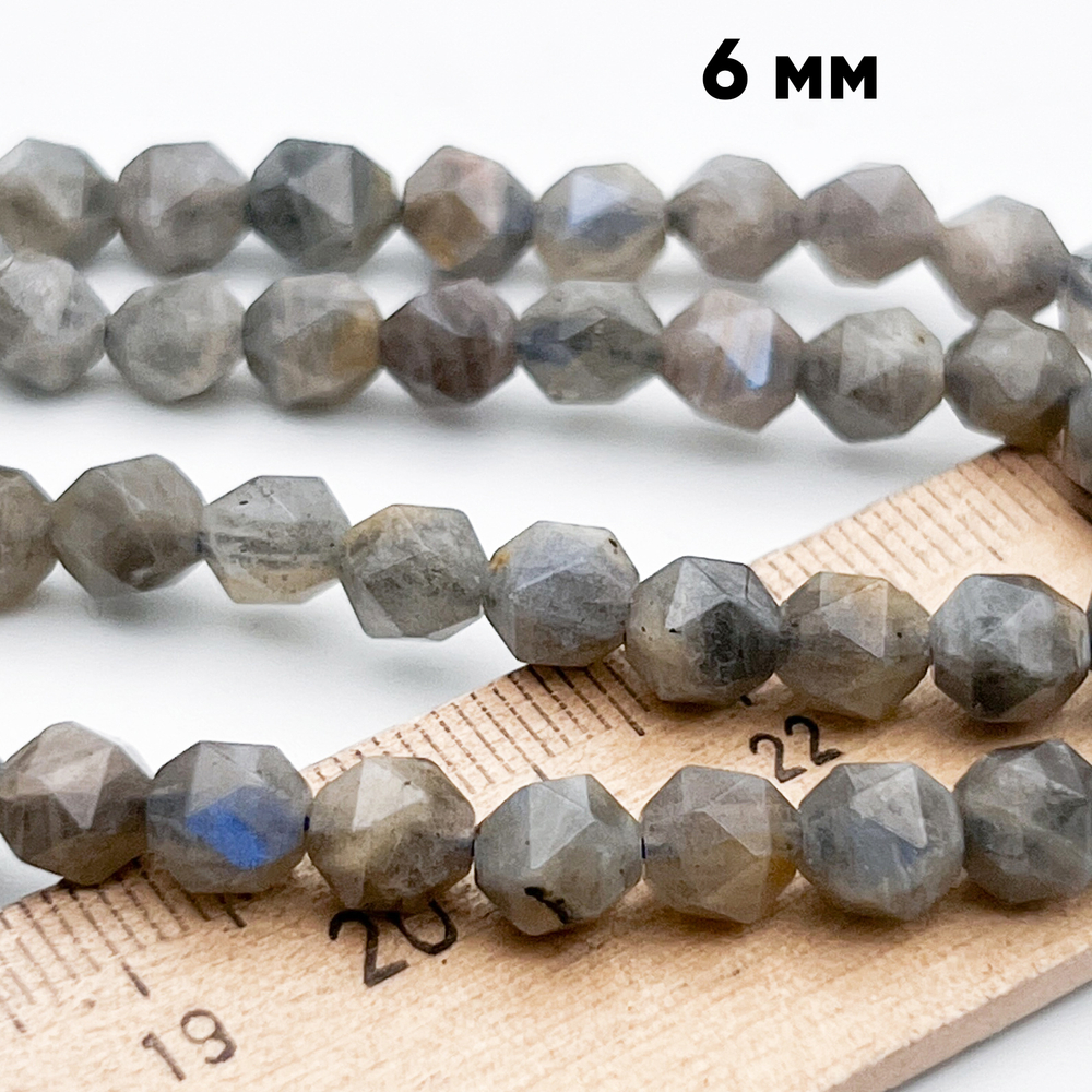 Лабрадор крупной огранки, размер около 6,5 мм, цена за 14-15 шт (1/4 нити)