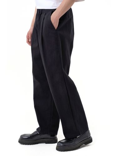 Черные брюки с защипами NORMIE NEW