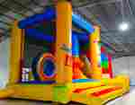 Коммерческий надувной батут «Поход в цирк» с горкой, 4*3,5*2,6 м.