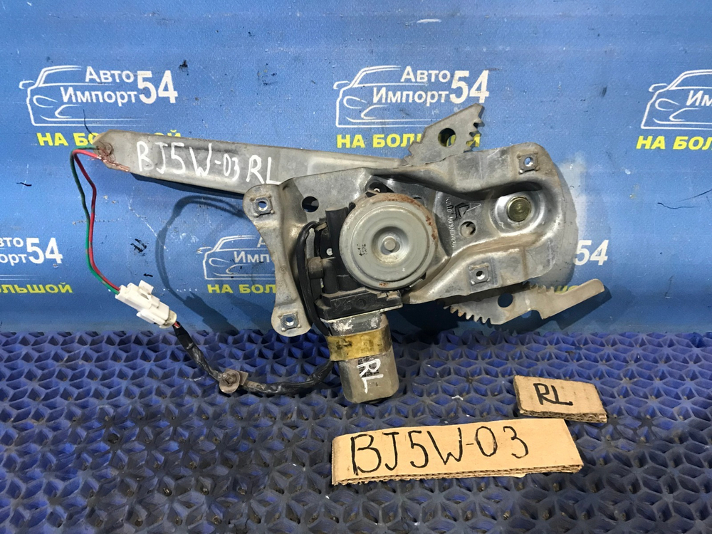 Стеклоподъемник задний левый MAZDA FAMILIA 2001