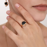 Кольцо «Летучая мышь» из красного золота с ониксом