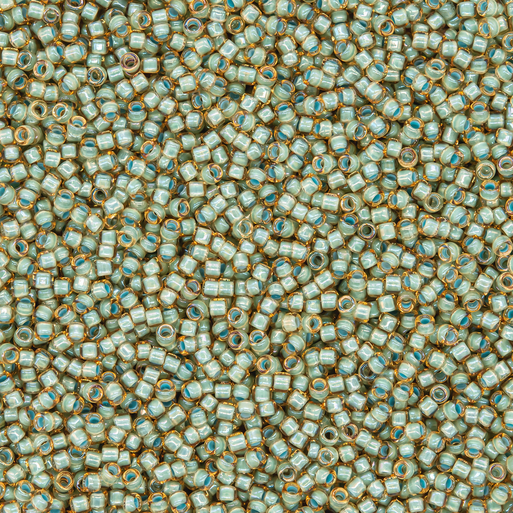 Японский бисер TOHO Round 15/0 (№952), окрашенный изнутри прозрачный